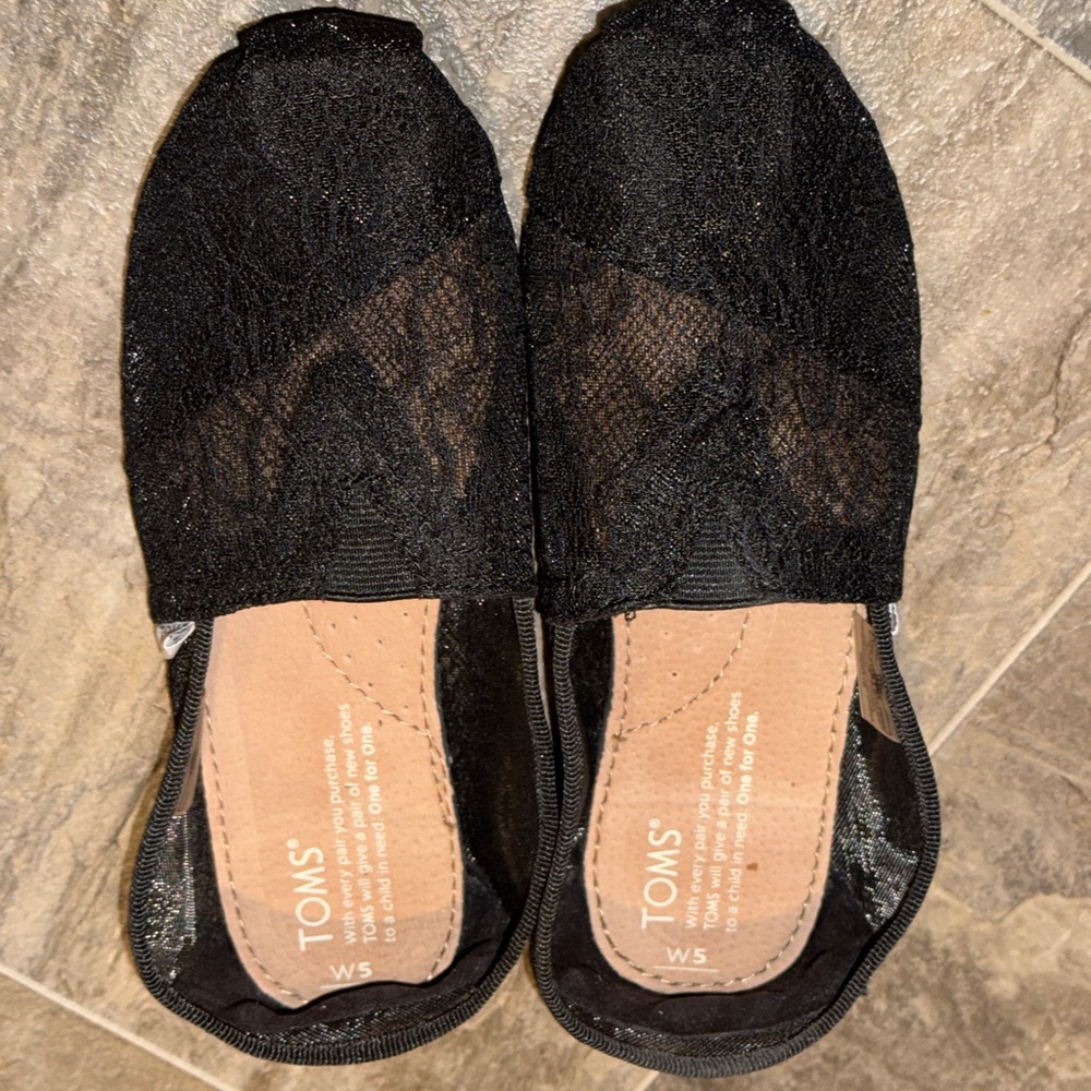 Toms Black Flats with Minimalist Slip-On Style